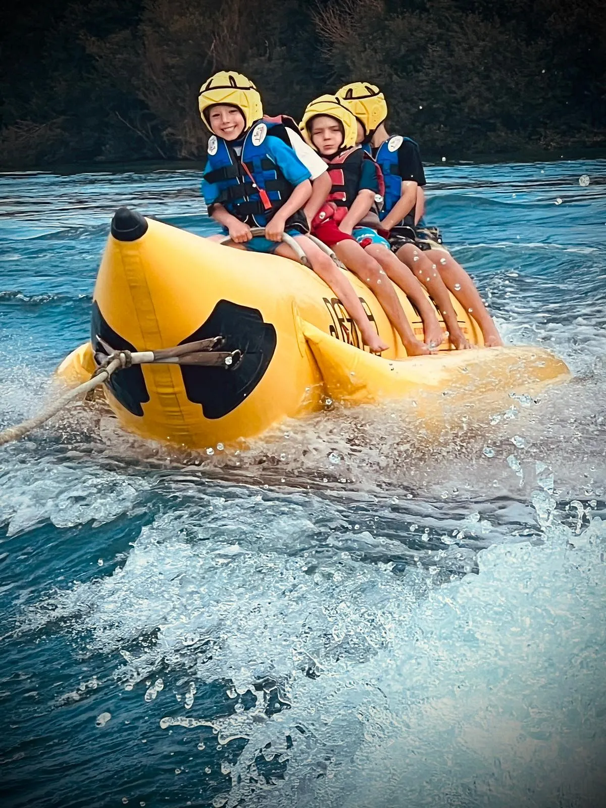 Fun on the banana inflatable ride